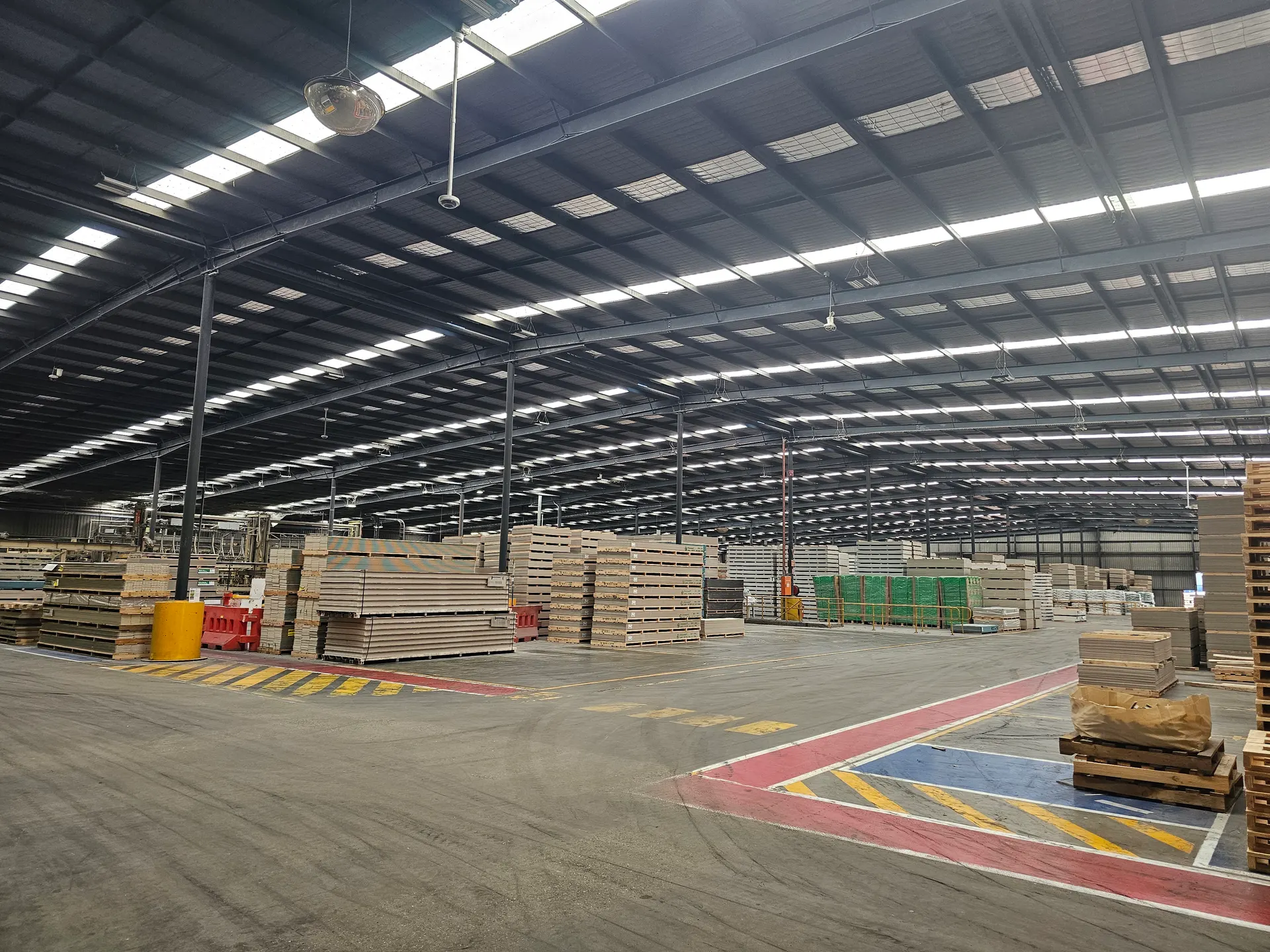 The same warehouse after fibreglass sheeting replacement, with daylight back across the floor